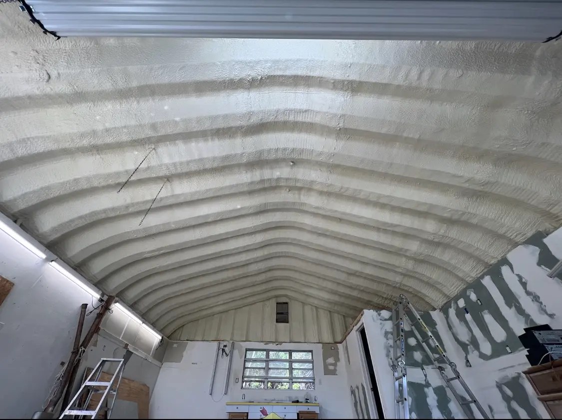 Spray polyurethane foam applied to the underside of a metal roof deck in River Rouge
